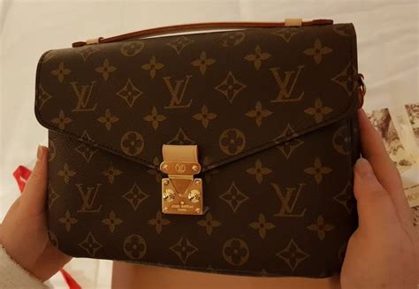 como saber si una bolsa lv es original|lv bolso original.